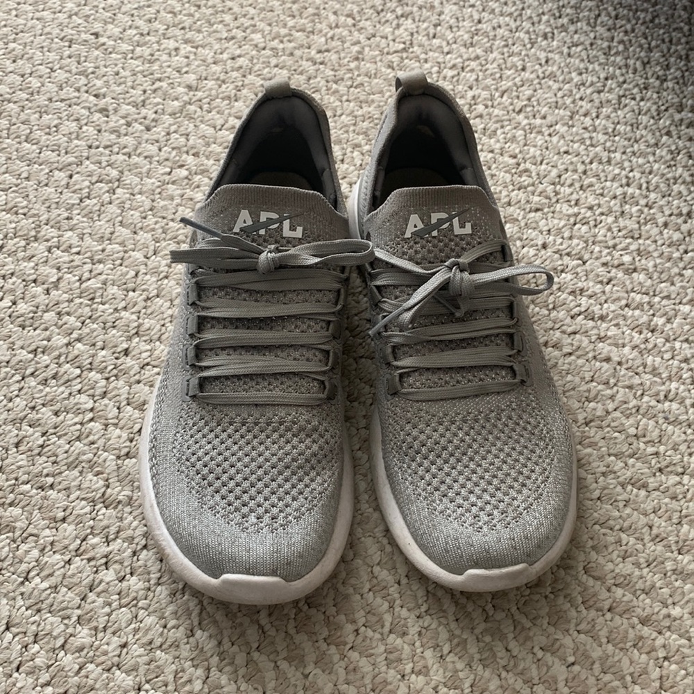 APL grey and silver knit tennis shoes